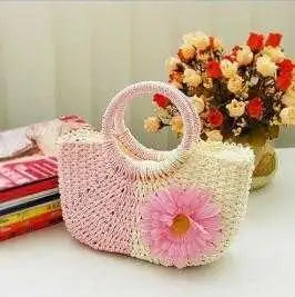 pink straw hand bag